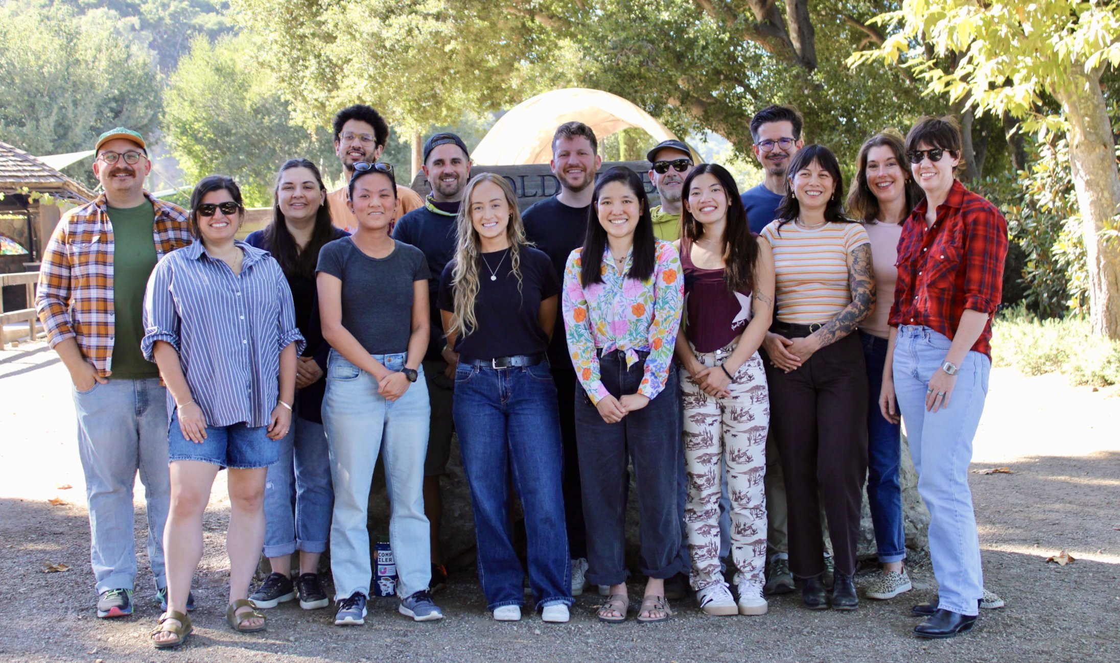 A group photograph of many members of the Compiler team at a winery in California.